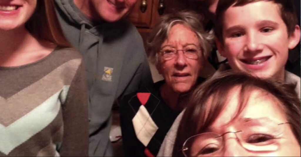 Charter Senior Living of Godfrey Video Thumbnail Family Group Surrounded by senior living resident